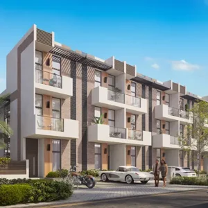 Row of contemporary buildings at Reportage Hills viewed from main road with landscaped surroundings