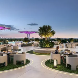 "Rooftop restaurant space with panoramic city views and elegant dining setup